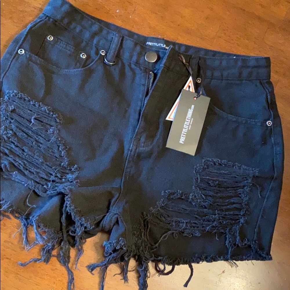 Black distressed jean shorts